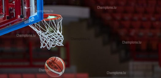 Basketball ball in hoop